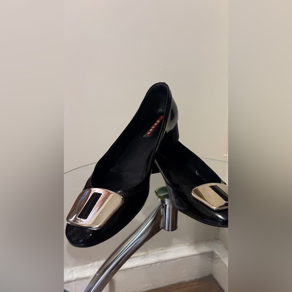 Prada Shoes - Prada Black Patent Leather Pumps with Silver Buckle